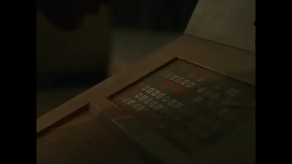 A close-up of a dusty vintage control console